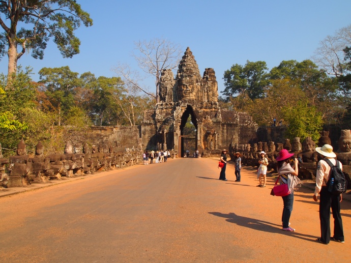 the east gate of angkor thom, flanked by 54 gods and 54 demons