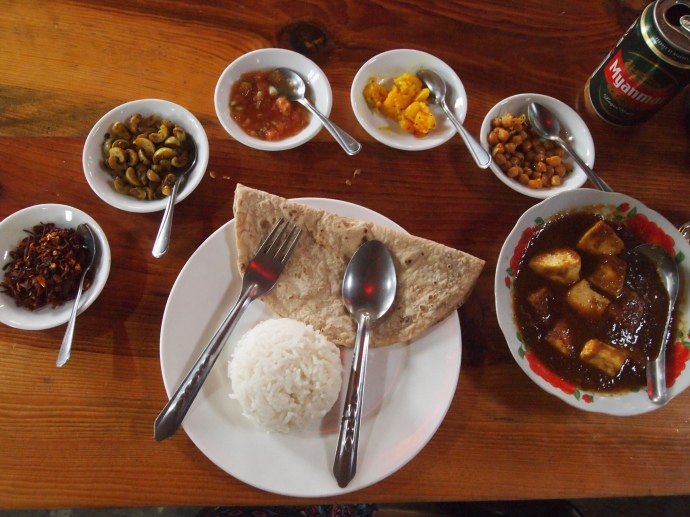 paneer curry, rice, chapati, chick peas and pumpkin accompaniments